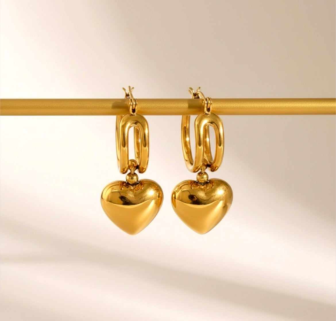 18K gold trendy unique sliding heart high-end design earrings